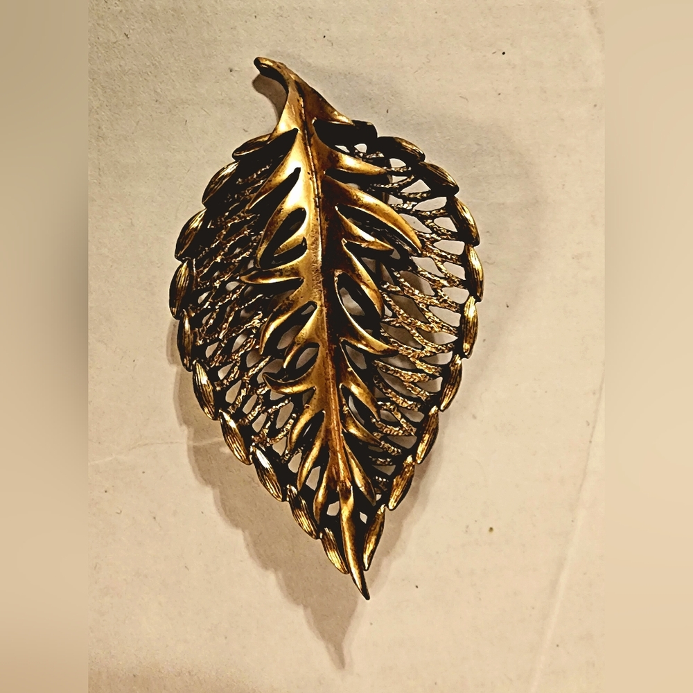Antique bronze tone filigree leaf brooch